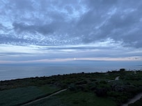Picture of moon setting in the morning from the balcony.