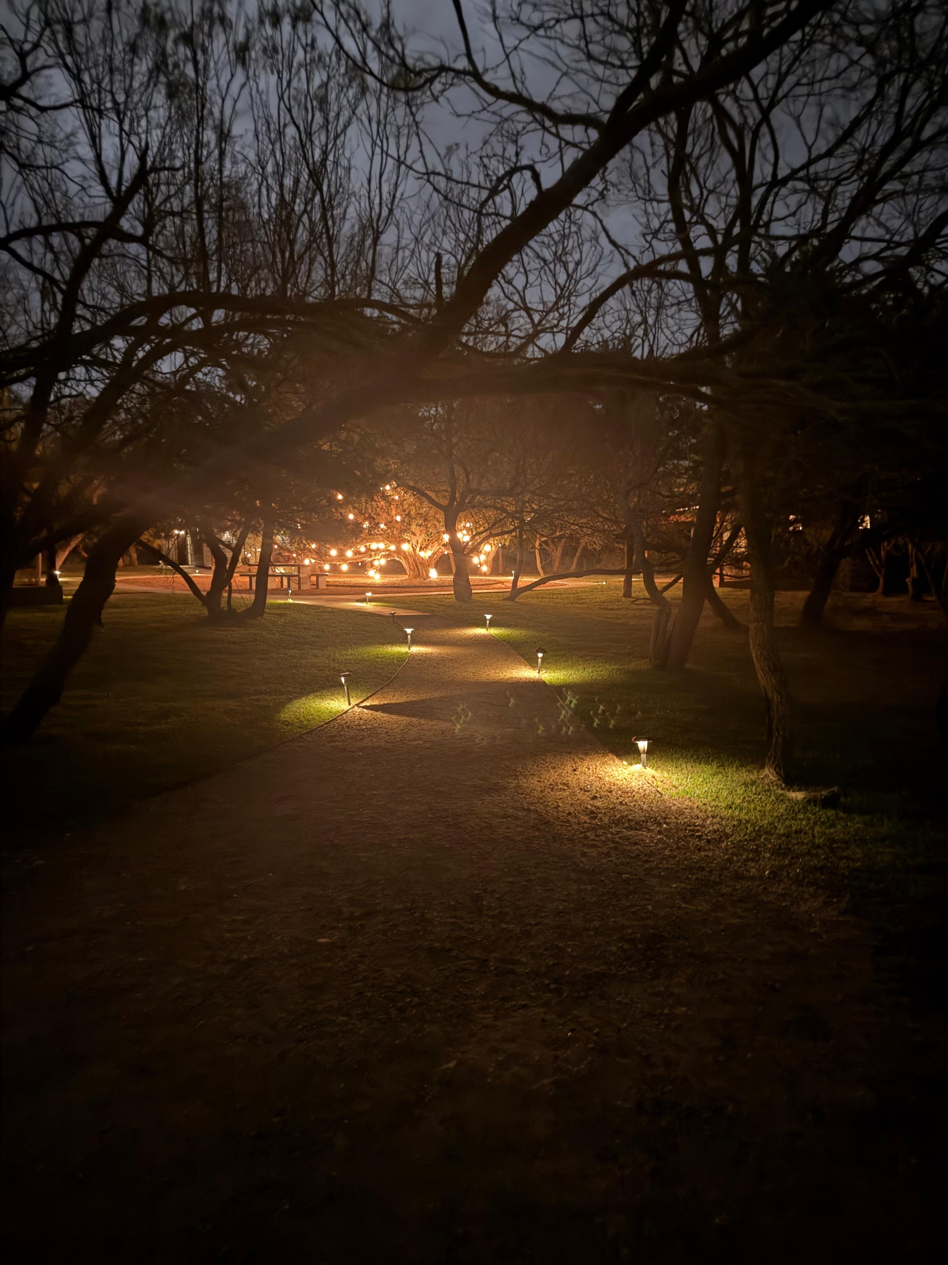Walkway towards the rooms .