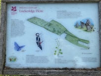 The cottage borders this National Trust property