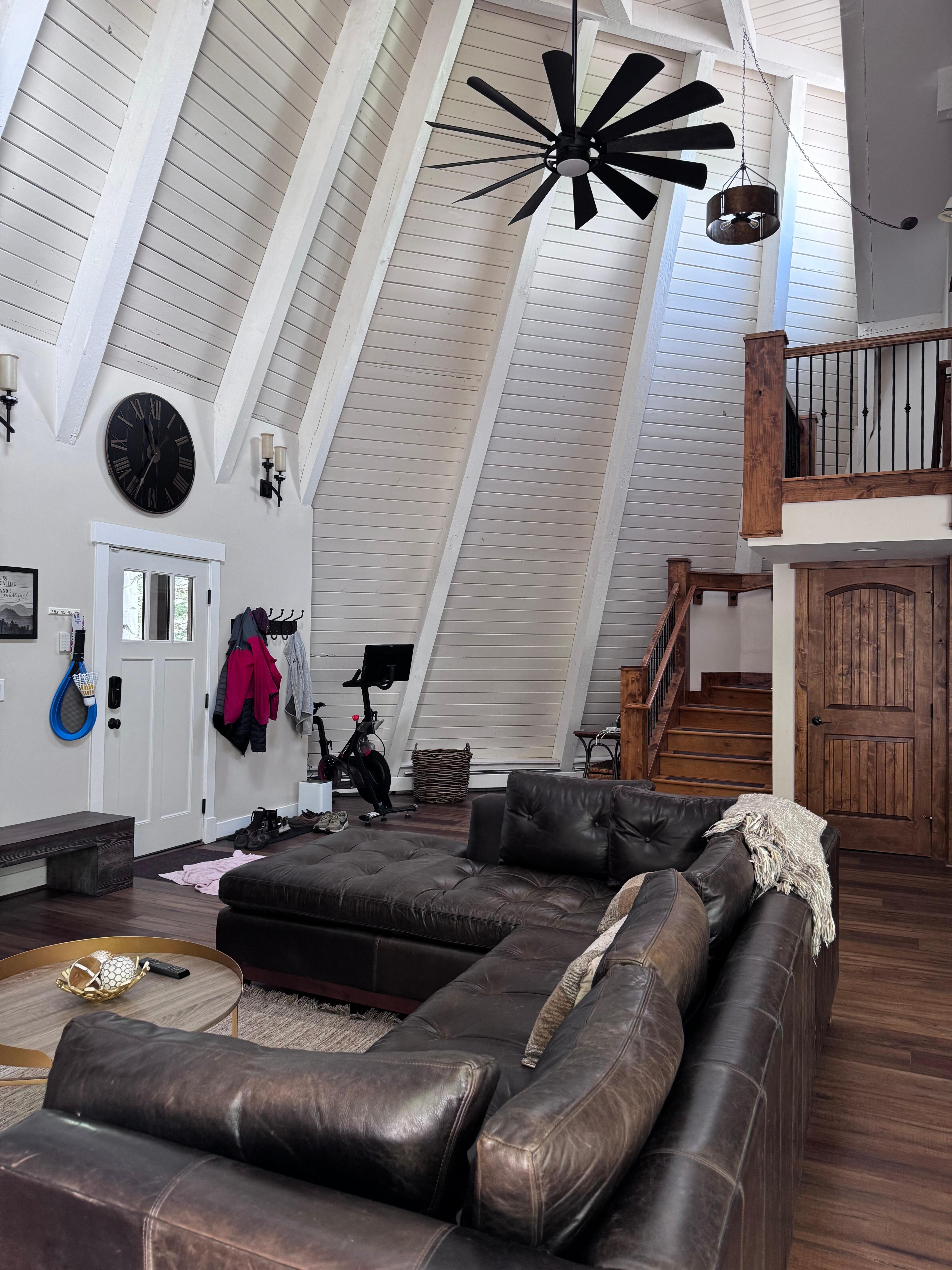 Family room and stairs up to two bedrooms, loft and laundry