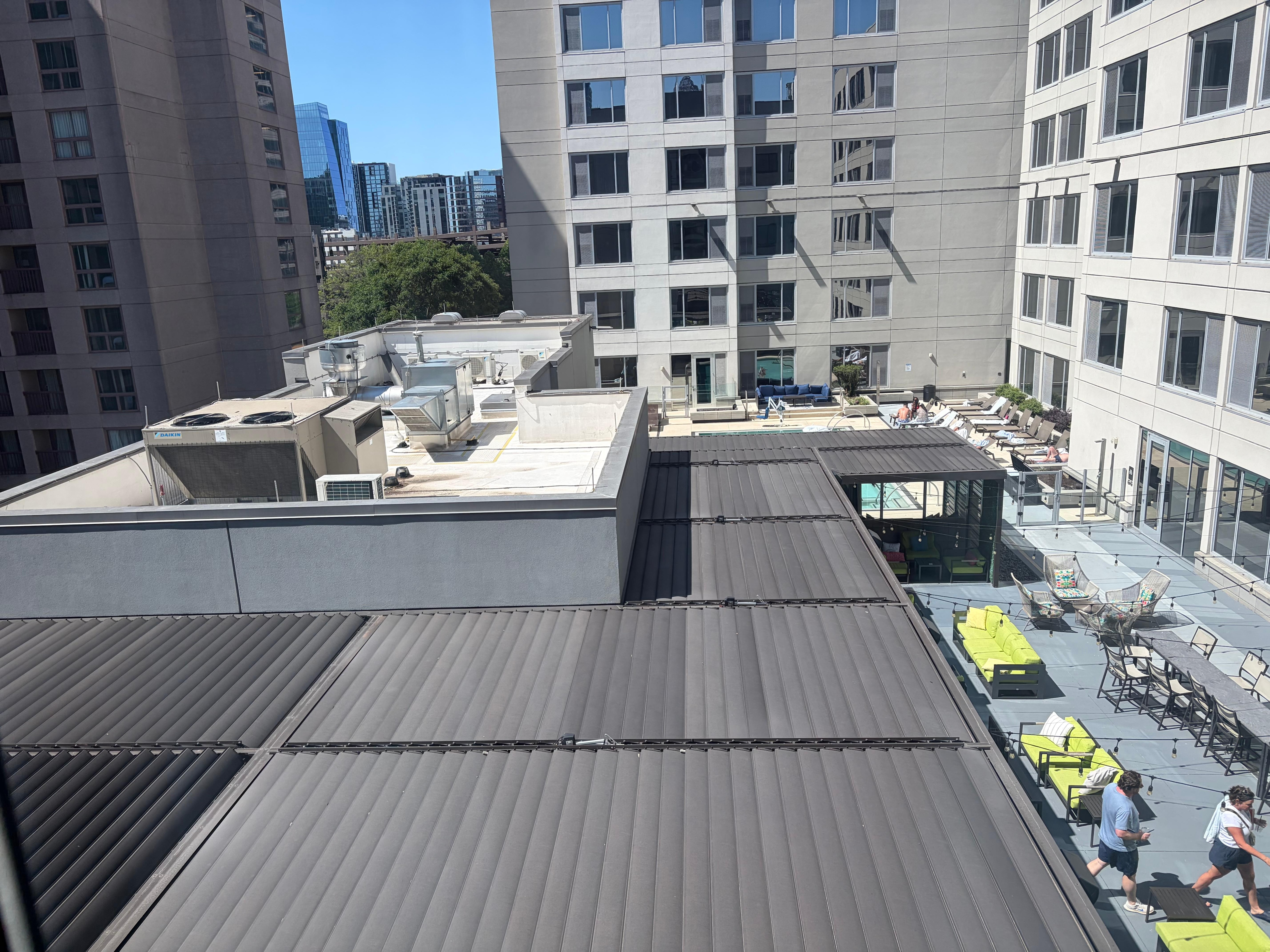 View from room of rooftop bar open til 11/12 but not much noise