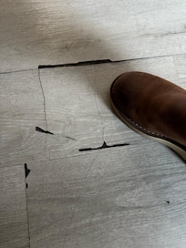 Soft spot in the floor where the flooring is broken