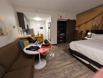 View from the same corner of the roo. But facing the sitting area looking toward the wardrobe/safe, and king sized bed.