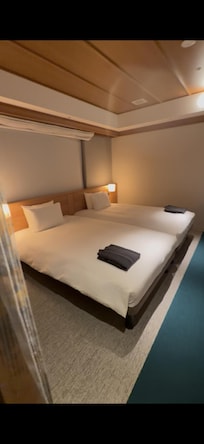 2 Twin beds with pajamas