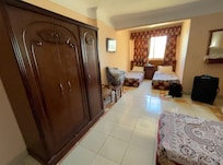 My hotel room with 4 beds