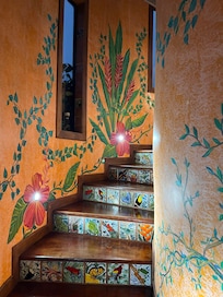 Wonderful tile work all around the house. Doors are beautiful.