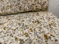 The counter with the sink in it.