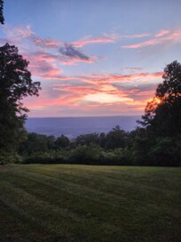 A stunning sunset with a mountain view.