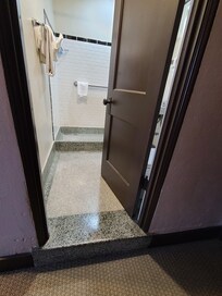 Step up to the small bathroom