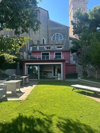 View of the villa with the church behind. Taken from the back yard of the villa.