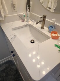 Beautiful and clean countertops kitchen and both bathrooms.