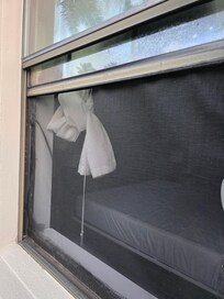 Front side of house sealed off bedroom window was up from the inside. We used hands that night to pull down for safety purposes.