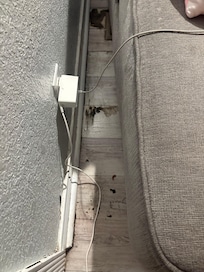 Behind the couch