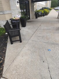 This is what they don't show you in the nice pictures you see the hotel. Garbage on the floor and overflowing with terrible smell.