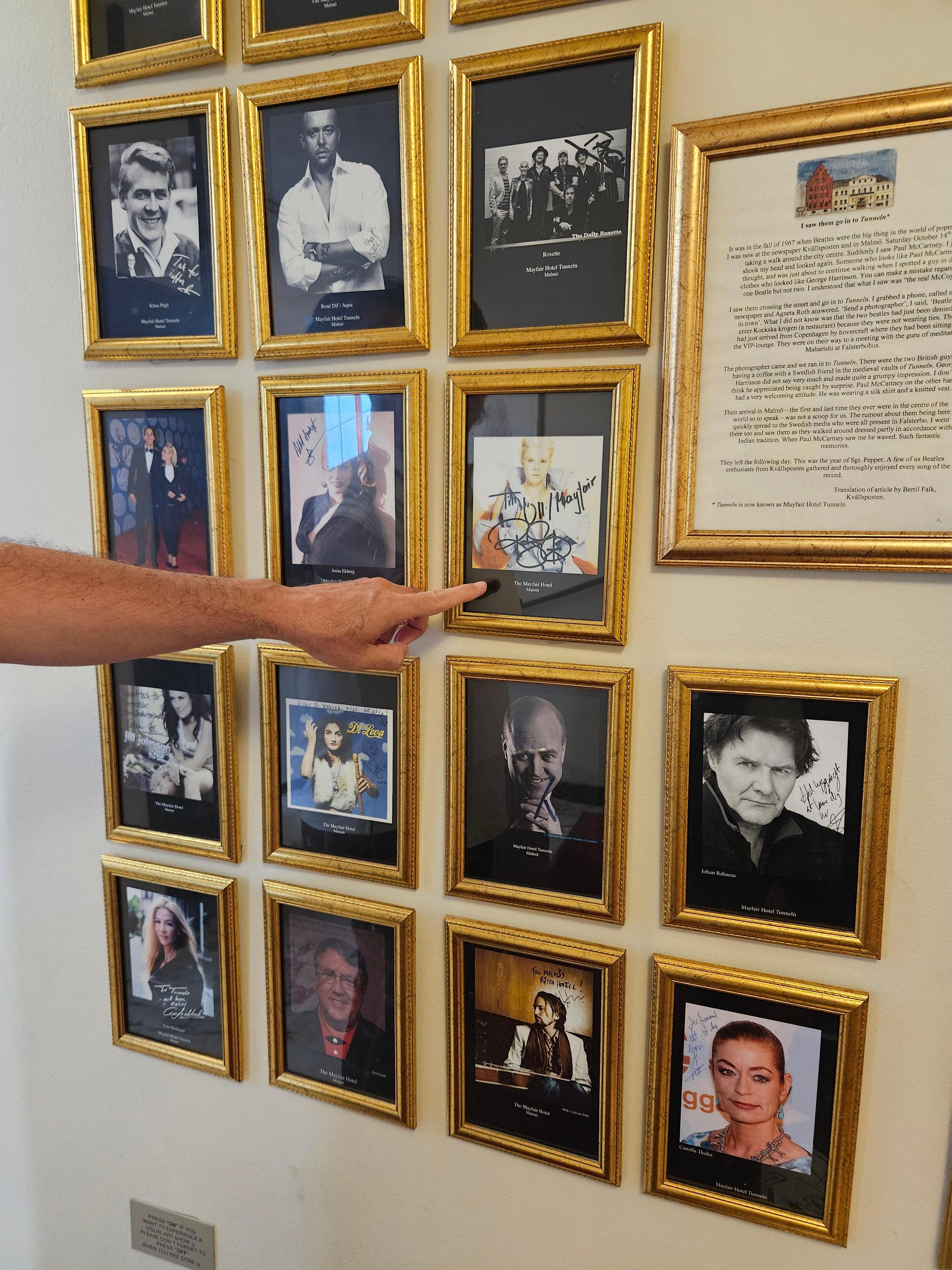 photos on the wall of celebrities who've also enjoyed their stay here