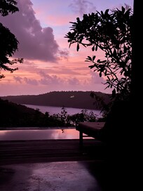 Sunset over private pool