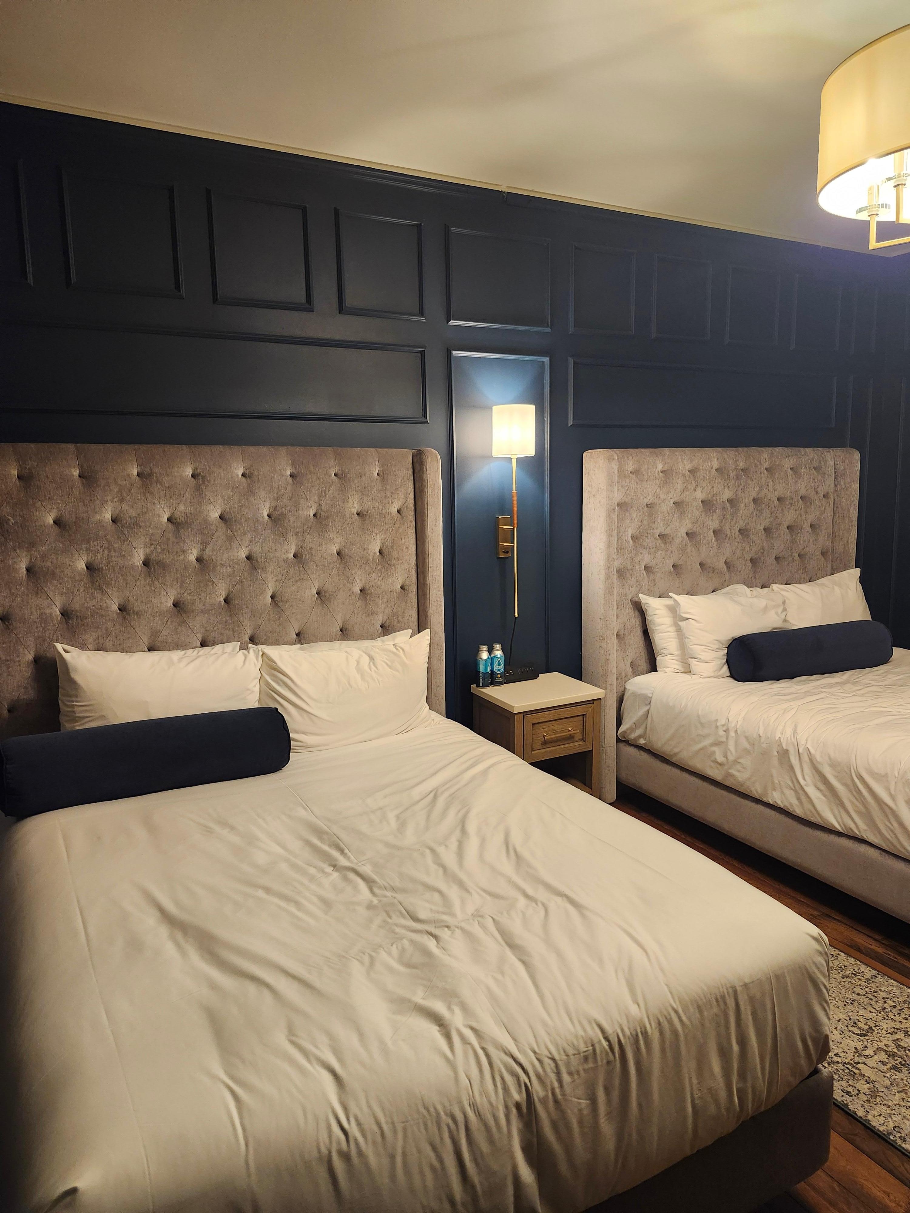 Typical queen beds, very comfortable. Great bathroom. Safe & mini fridge. 