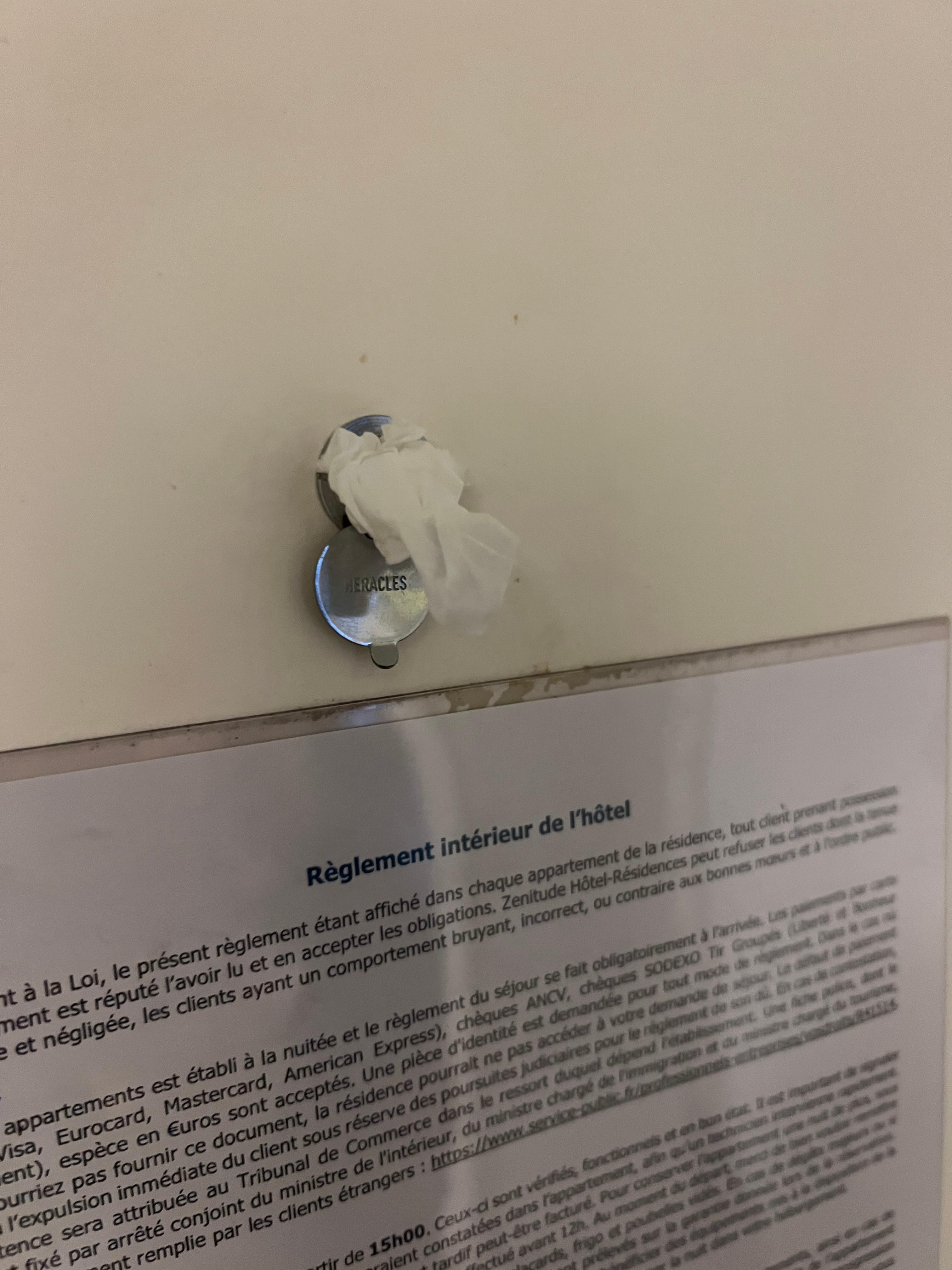 Someone (a previous guest) apparently plugged the eyehole with toilet paper!