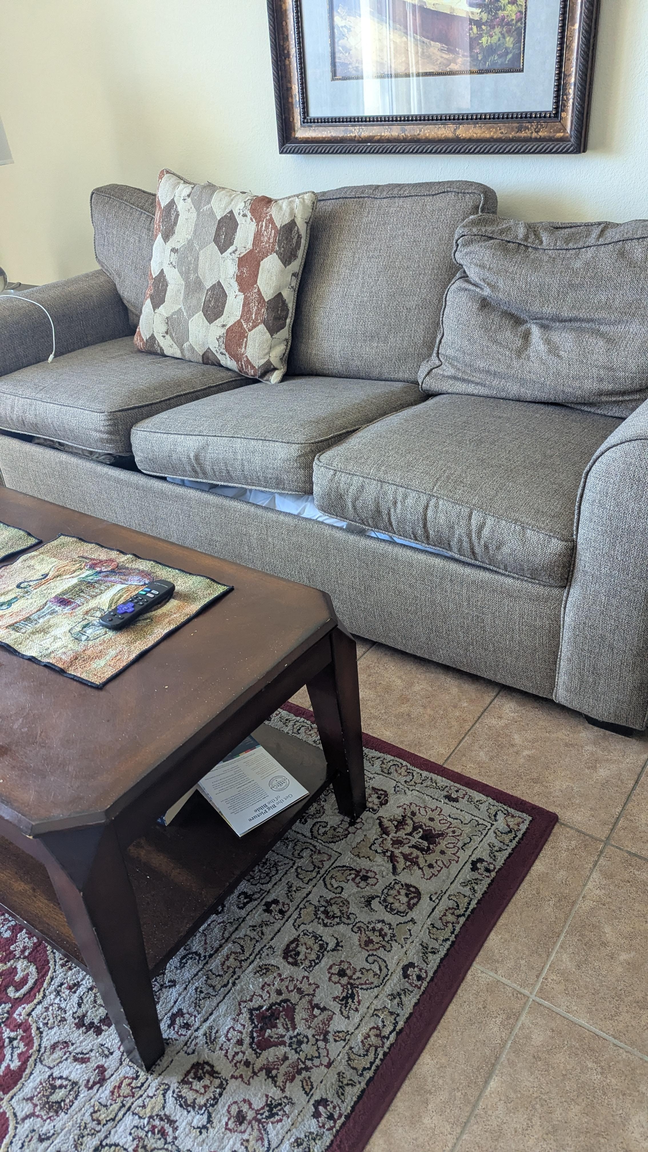 The cushion sunk into the couch because of the sagging sofa bed. We added pillows under the cushions so we could actually sit on the sofa.