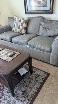The cushion sunk into the couch because of the sagging sofa bed. We added pillows under the cushions so we could actually sit on the sofa.