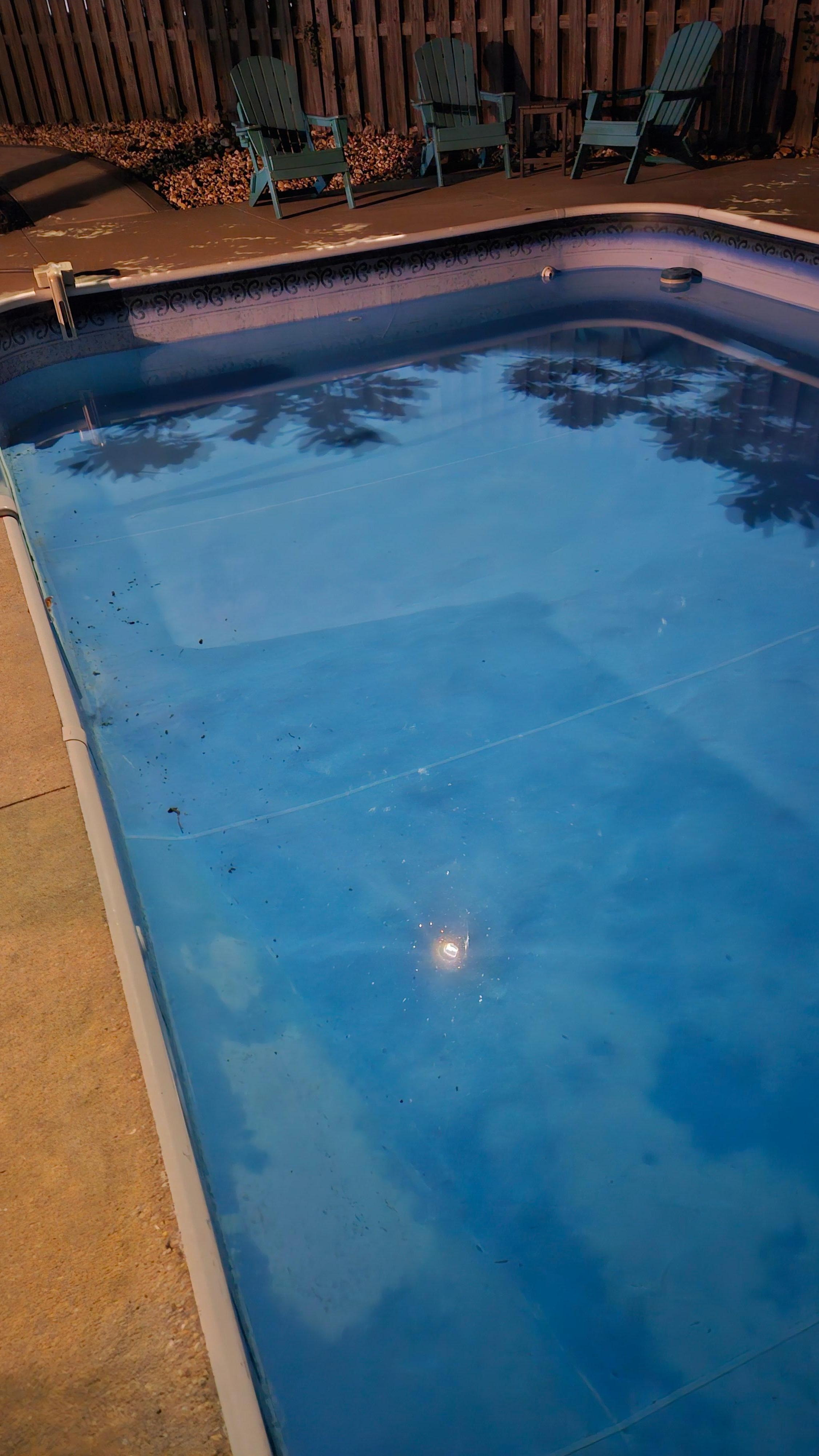 Trash debris on the bottom of the pool