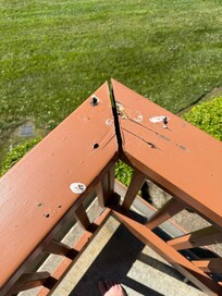 Railing was completely disconnected at the corner and railing on the right was loose