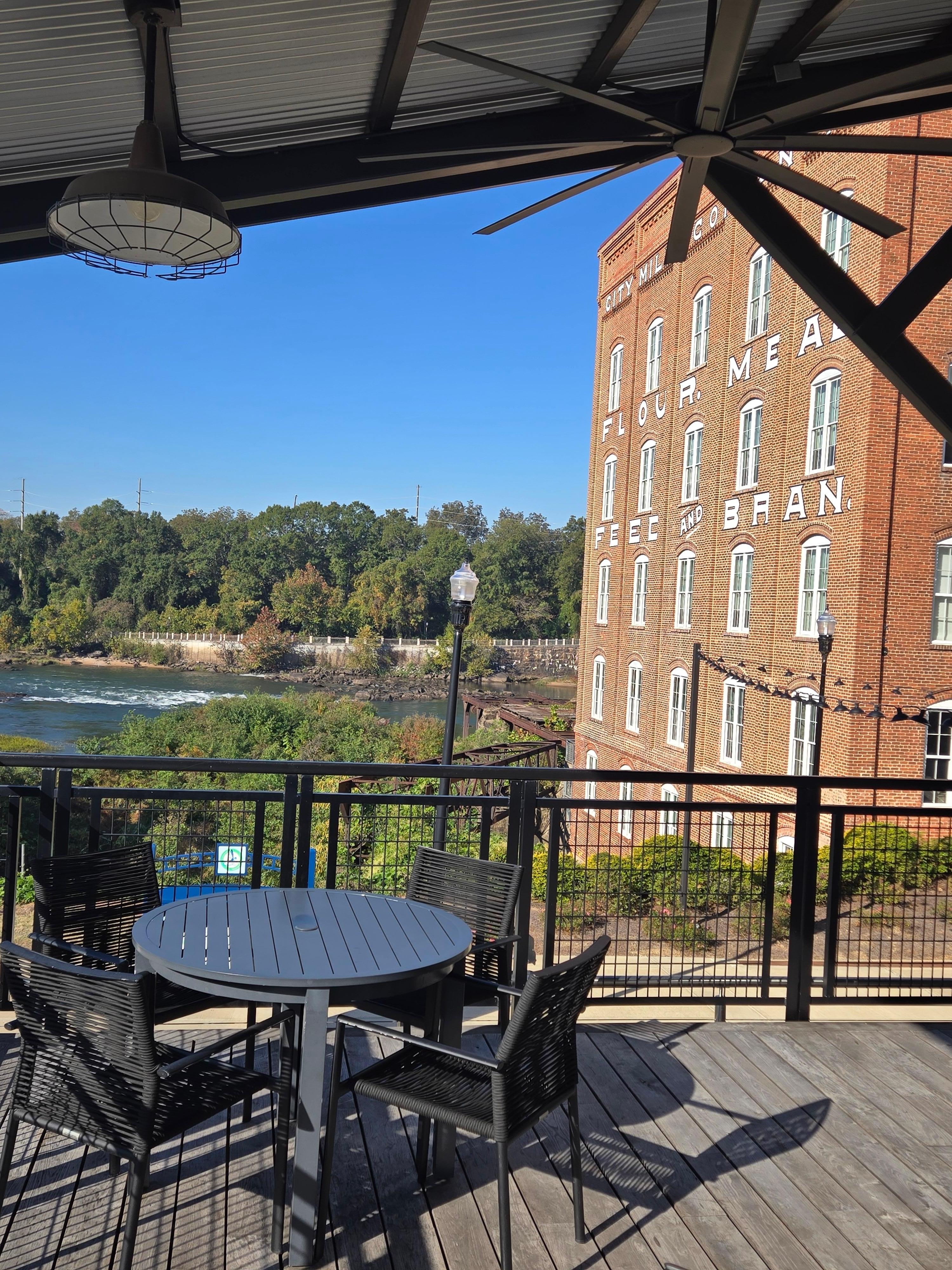 Hotel with white water river.