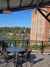 Hotel with white water river.
