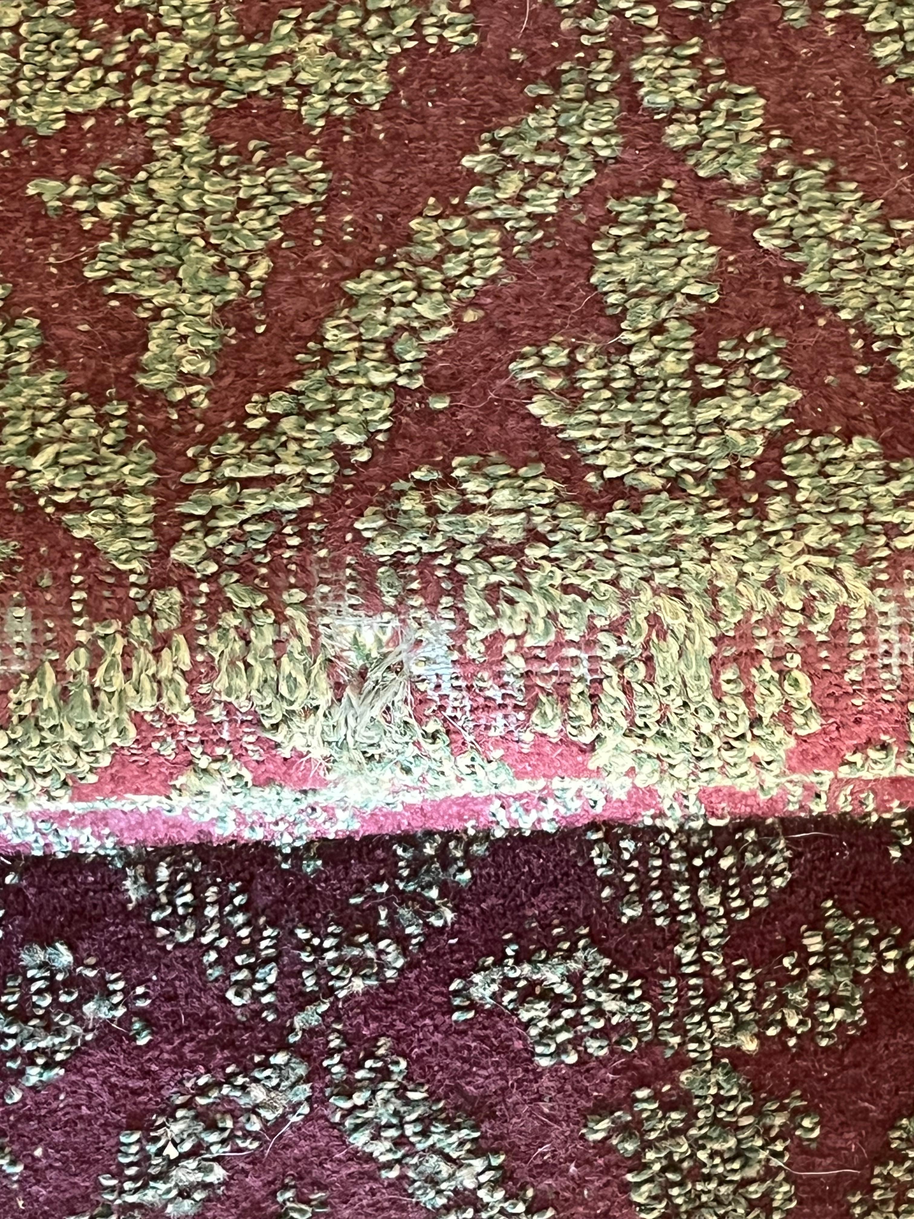 Shabby worn out hallway carpeting. 