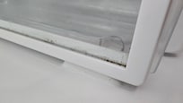 This is the refrigerator. Underneath this removable piece of glass was extremely nasty.