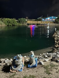 Pond and restaurant and the resort at night.
