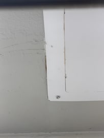 Cracked and rusted ceiling from leak