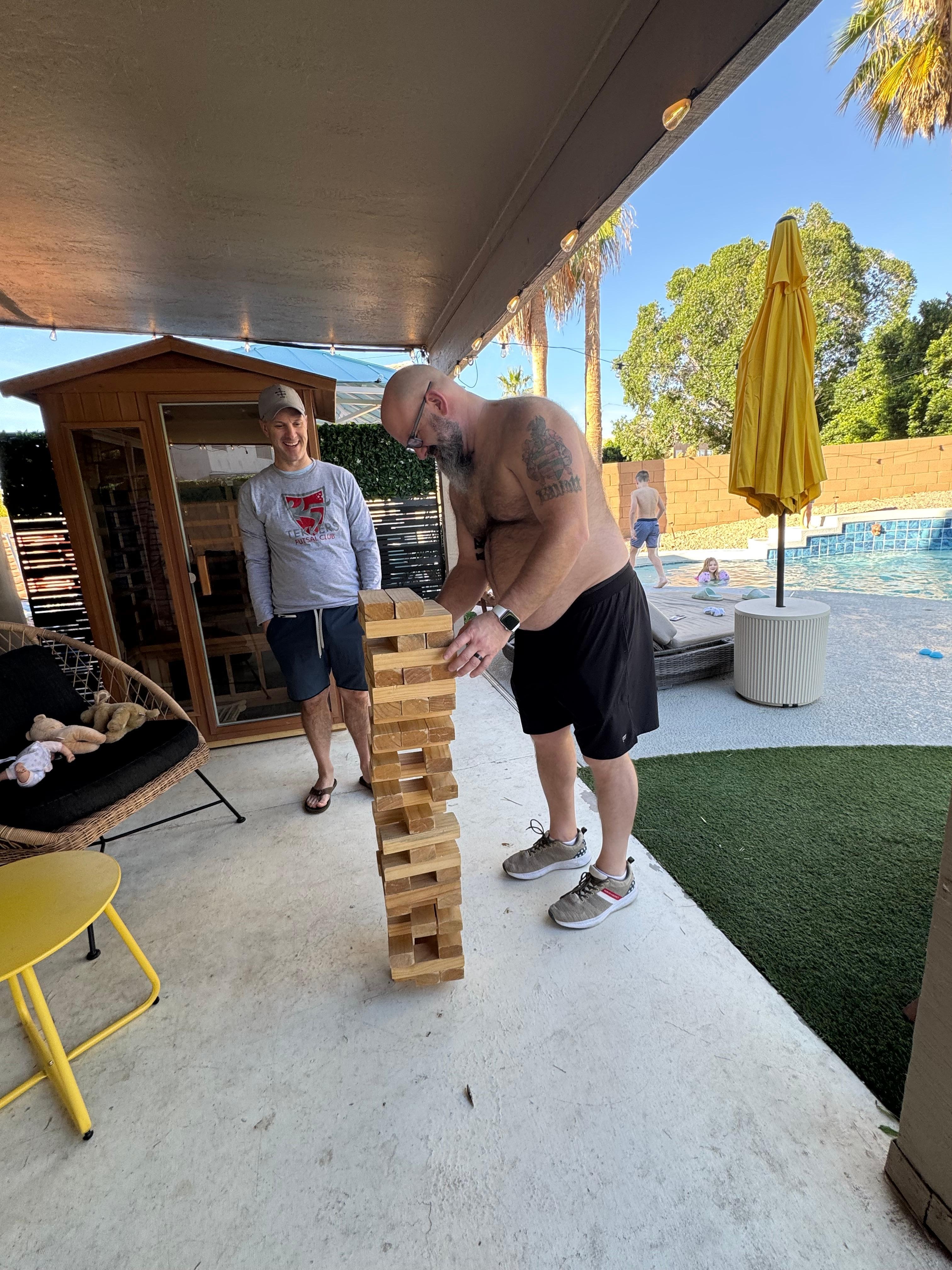 Brothers playing Jenga