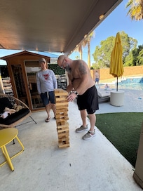 Brothers playing Jenga