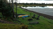 Private black sand beach, fire pit, kayaks