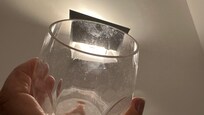 Glasses with Lip marks and finger prints.