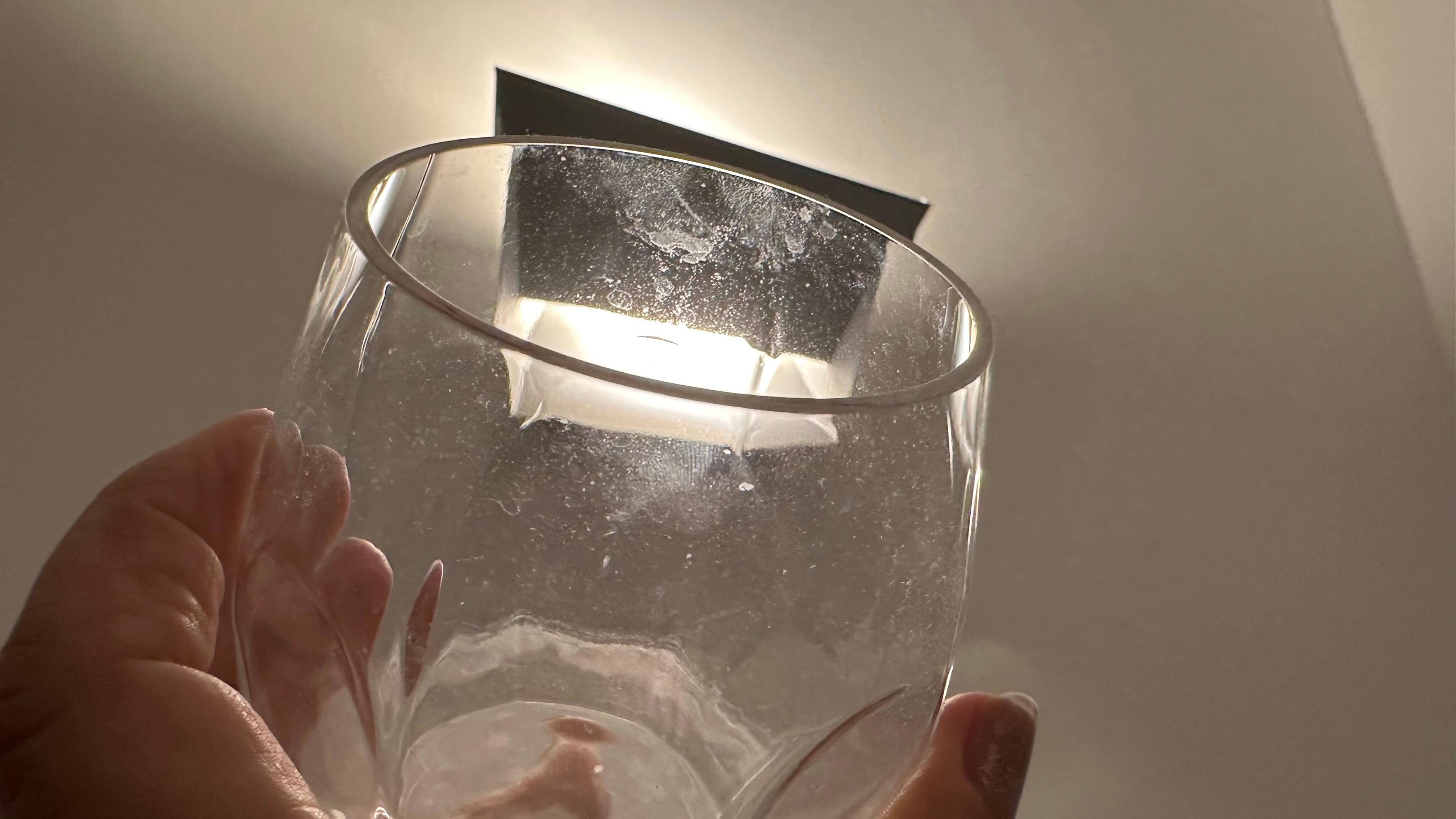Glasses with Lip marks and finger prints. 