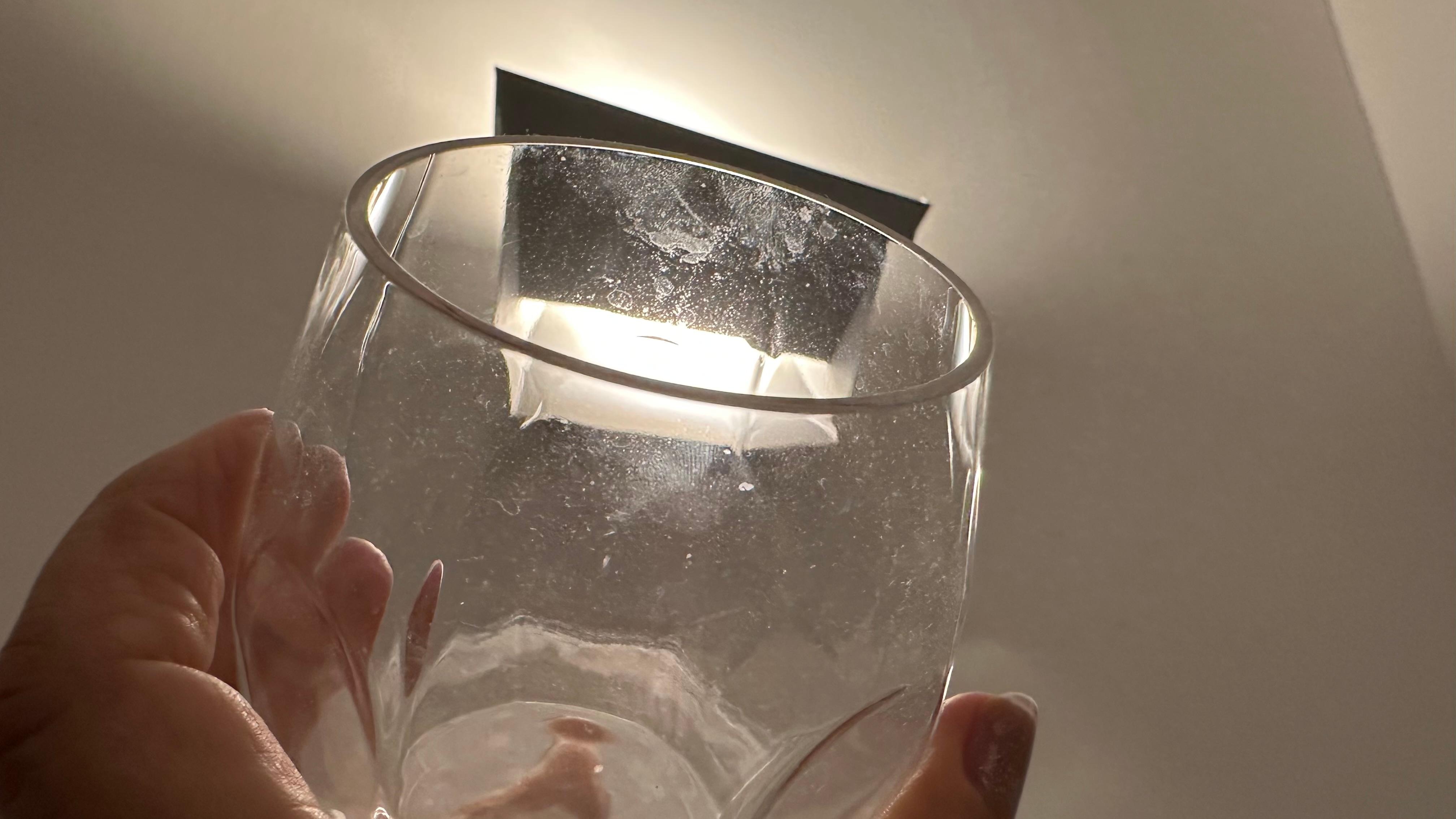 Glasses with Lip marks and finger prints.