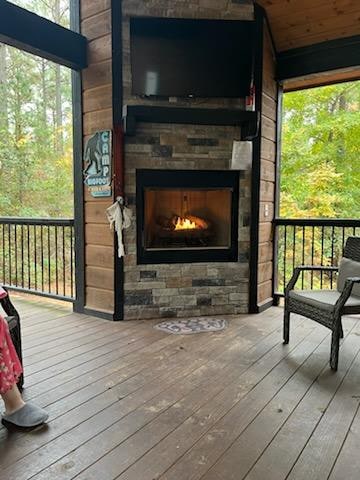 Relaxing outdoor Fireplace! Check out the ghost we hung.
