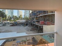View of construction site off balcony