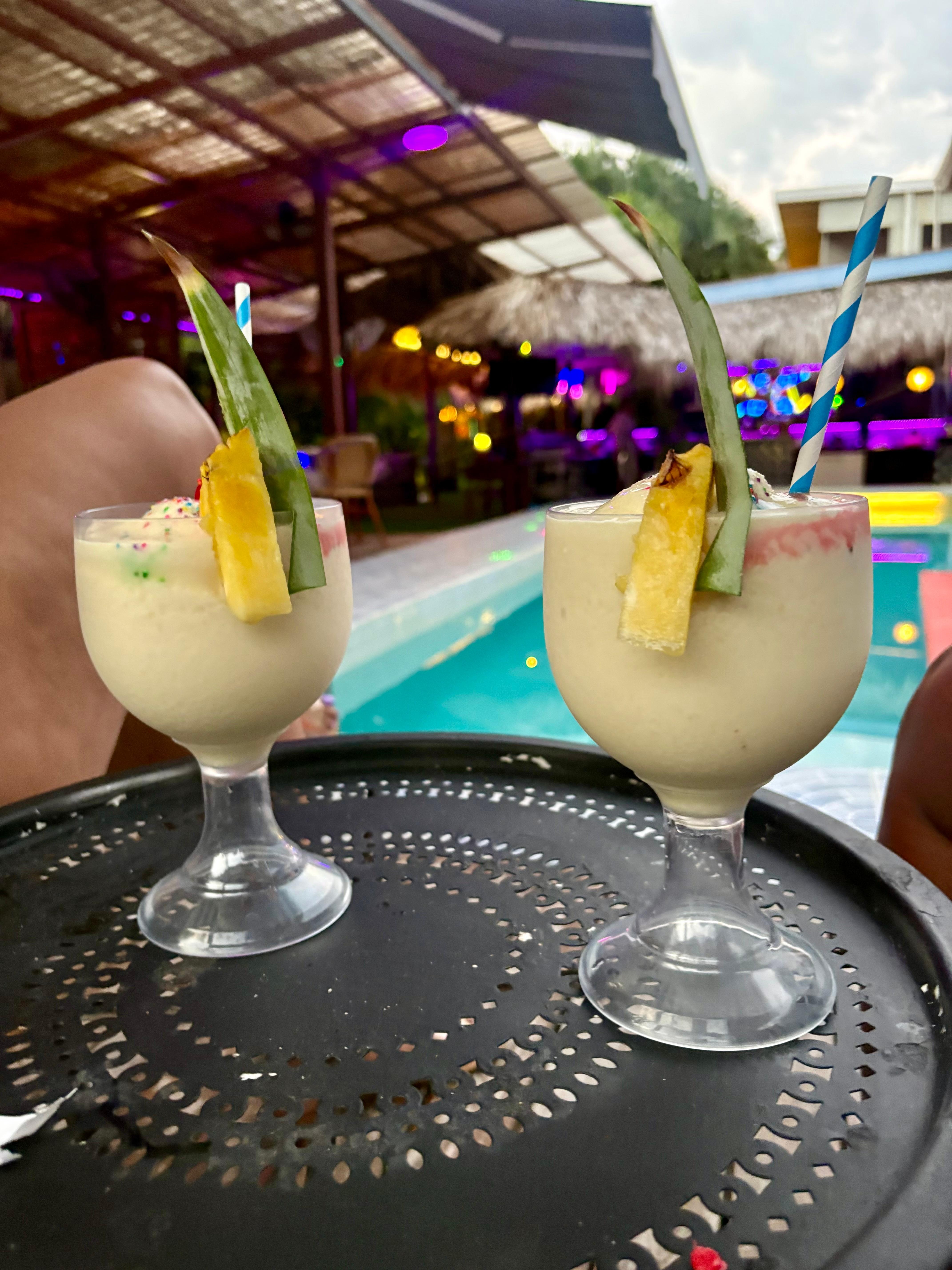 Pina coladas by the pool.