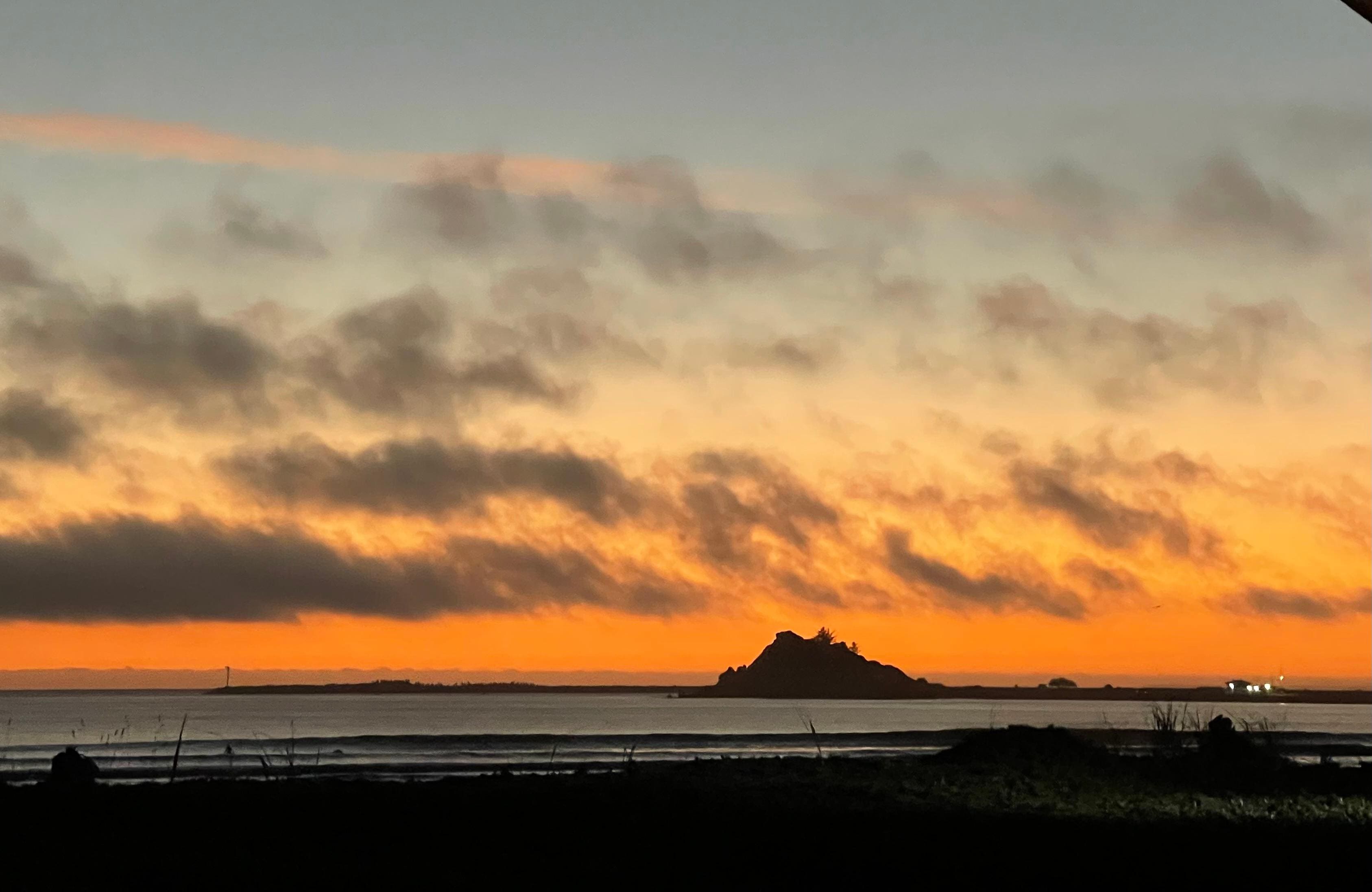 Beautiful sunset from the back deck of the room. Right on the beach. 