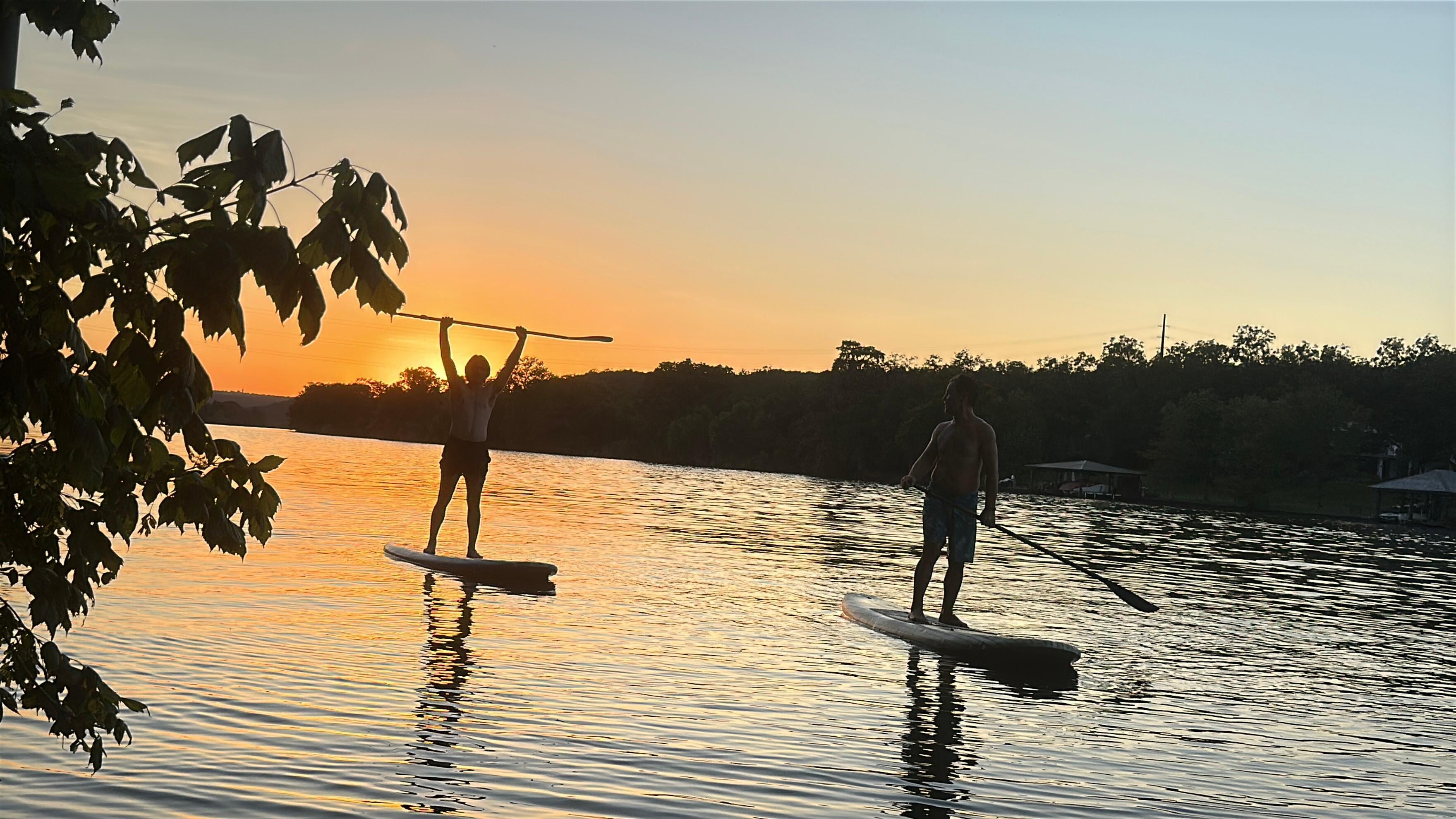 Paddle boarding at sunset