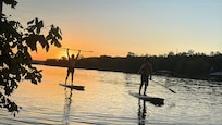 Paddle boarding at sunset