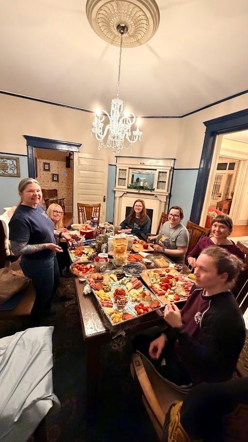 Late night charcuterie construction for the wedding the next day.