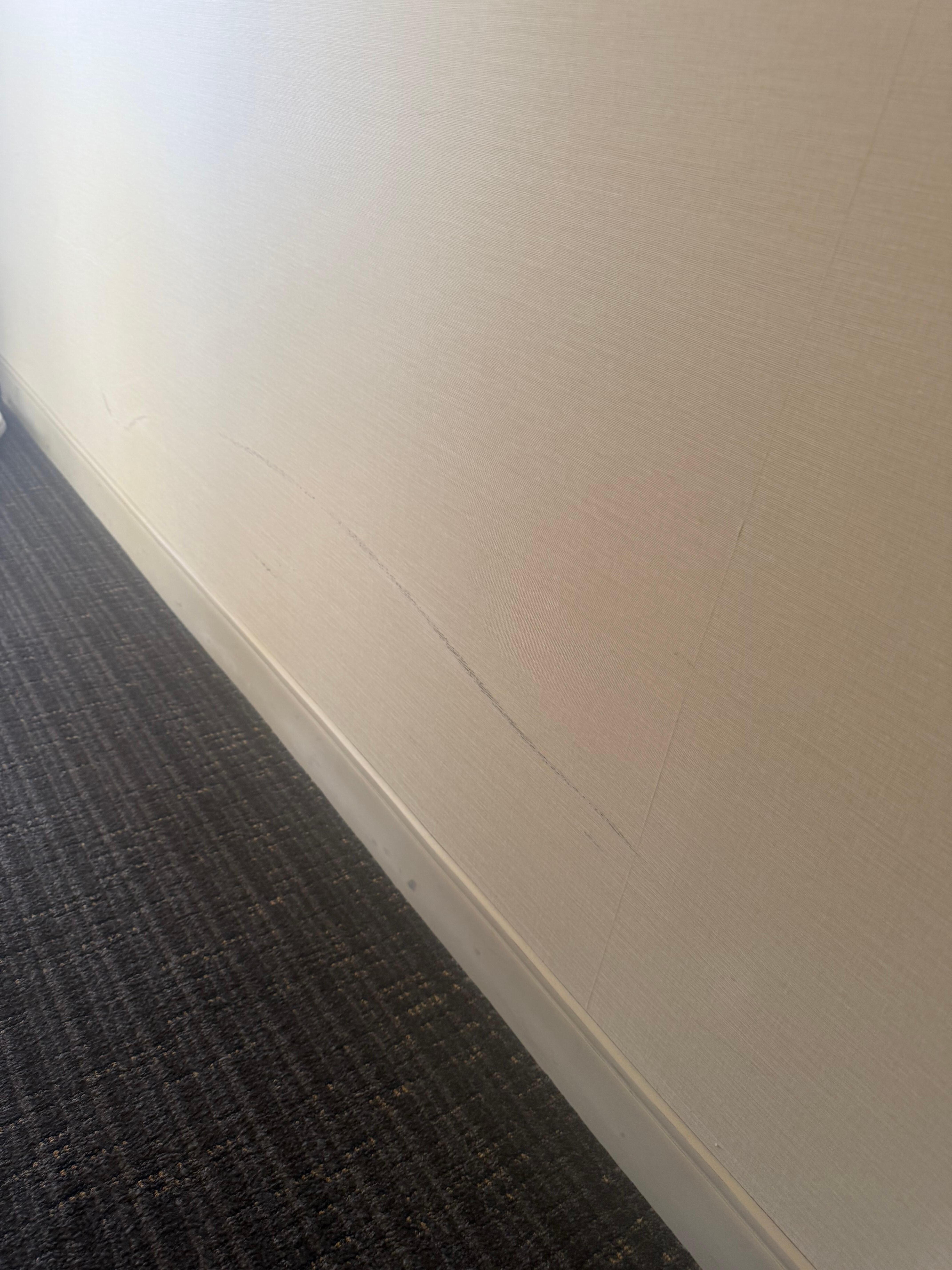 Marks on walls in room 