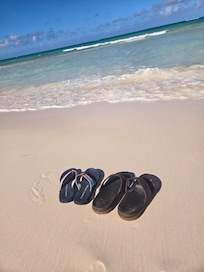 Beach is soft pink sand and clean!
