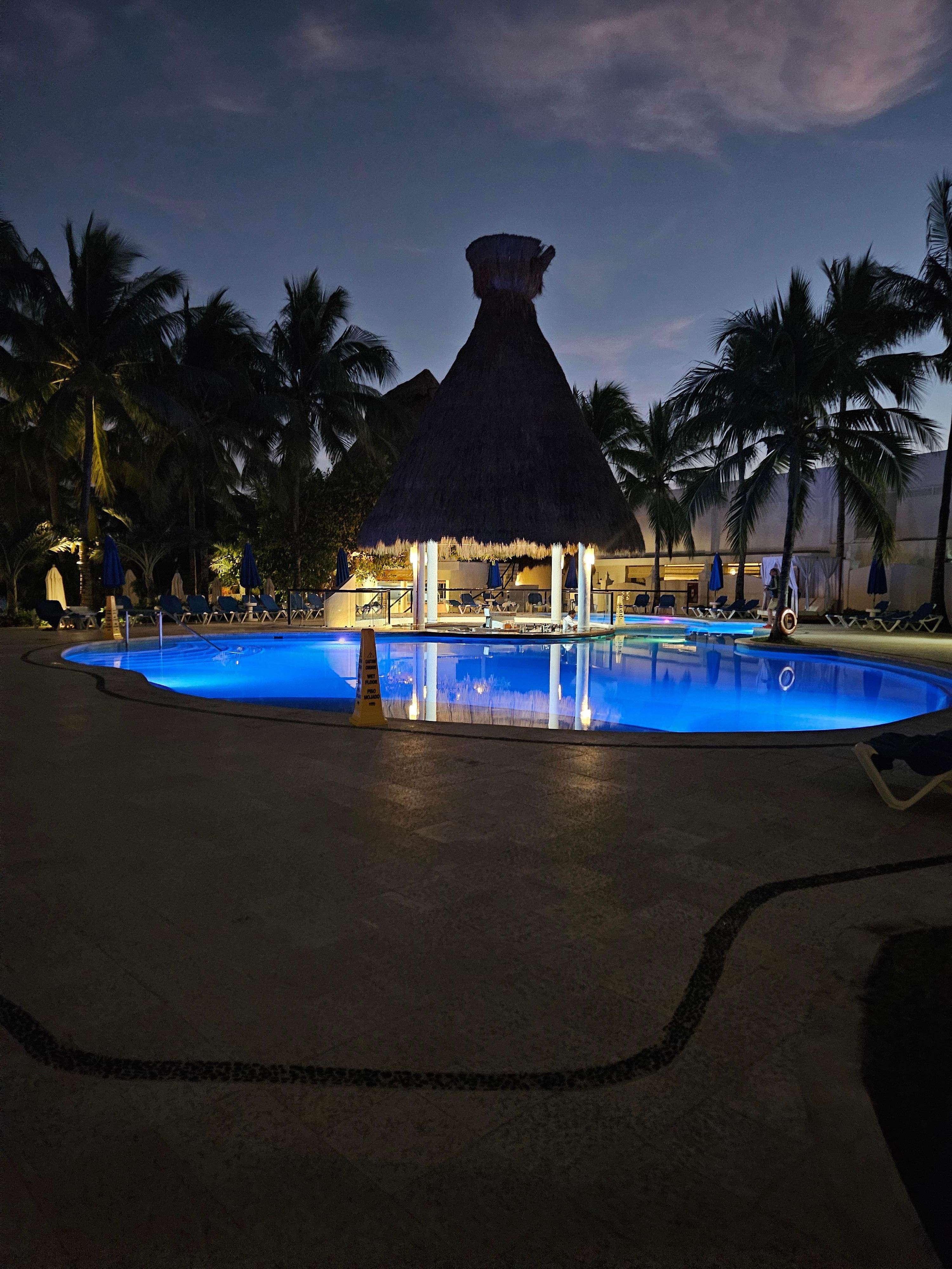 Swim up bar at night