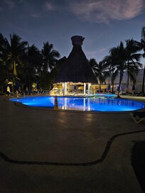 Swim up bar at night