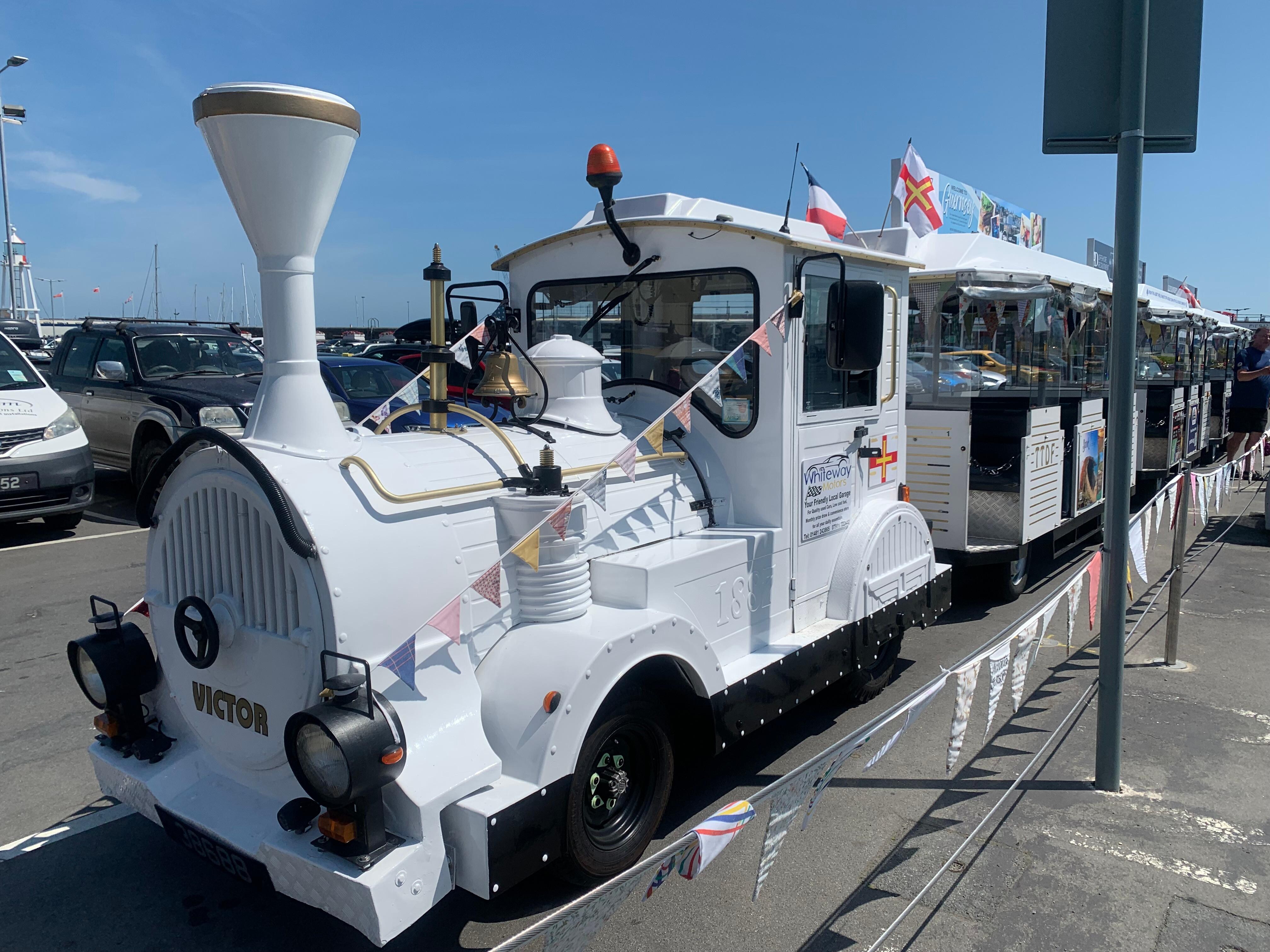 Catch the little train on the pier. 